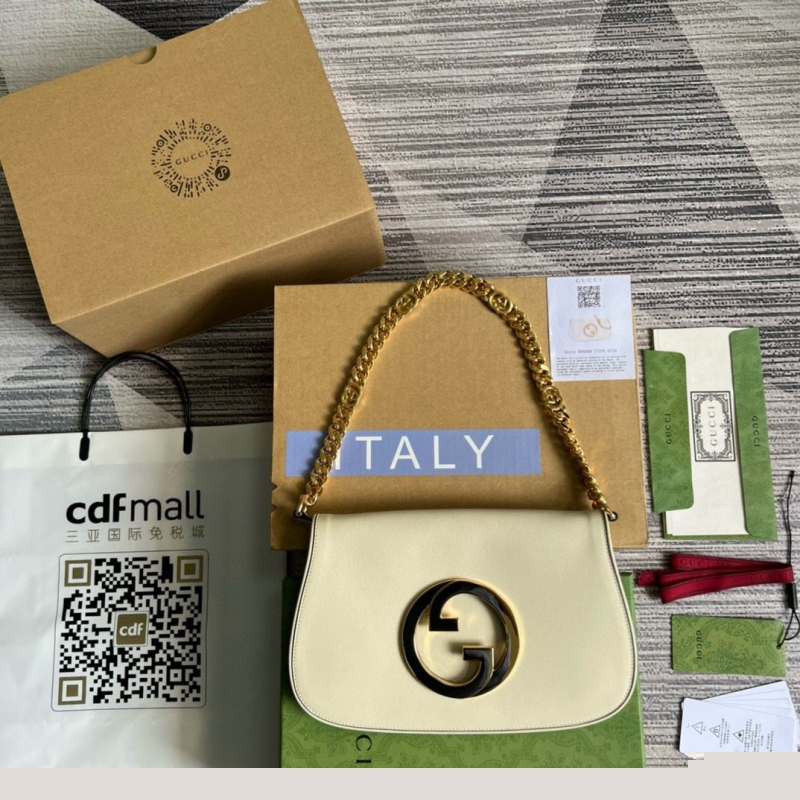 G*u*i top handle bags